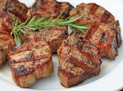 Lamb chops and Rosemary Complement each other in favor