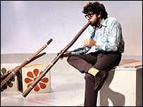 Rolf Harris made the digaridoo well known in the UK in his long career as an entertainer/artist/broadcaster